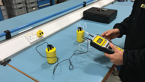 Checking ESD working surface using a surface resistance tester